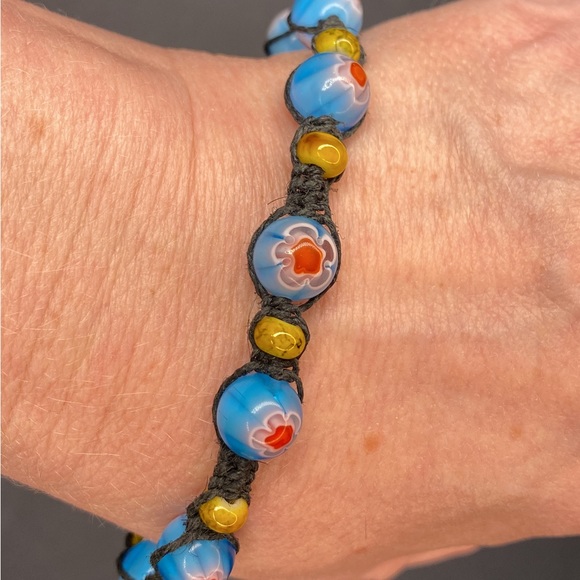 Lavonne Ricker Jewelry - HANDCRAFTED/HANDMADE Red, White, and Blue Glass Flower Beads with Black Hemp